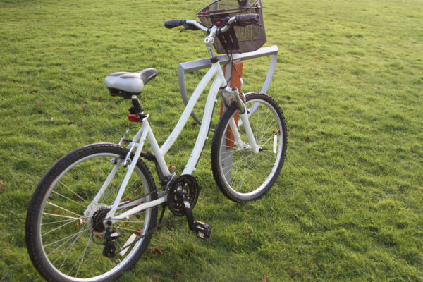 cycle stand with a cycle- produced by Orchard Street Furniture
