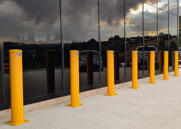 yellow metal bollards