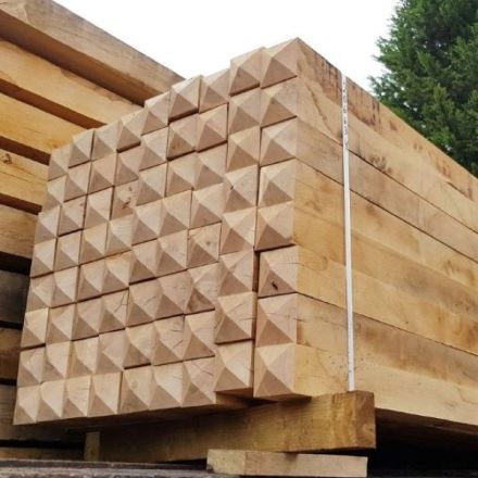 a pallet of timber bollards ready for shipping